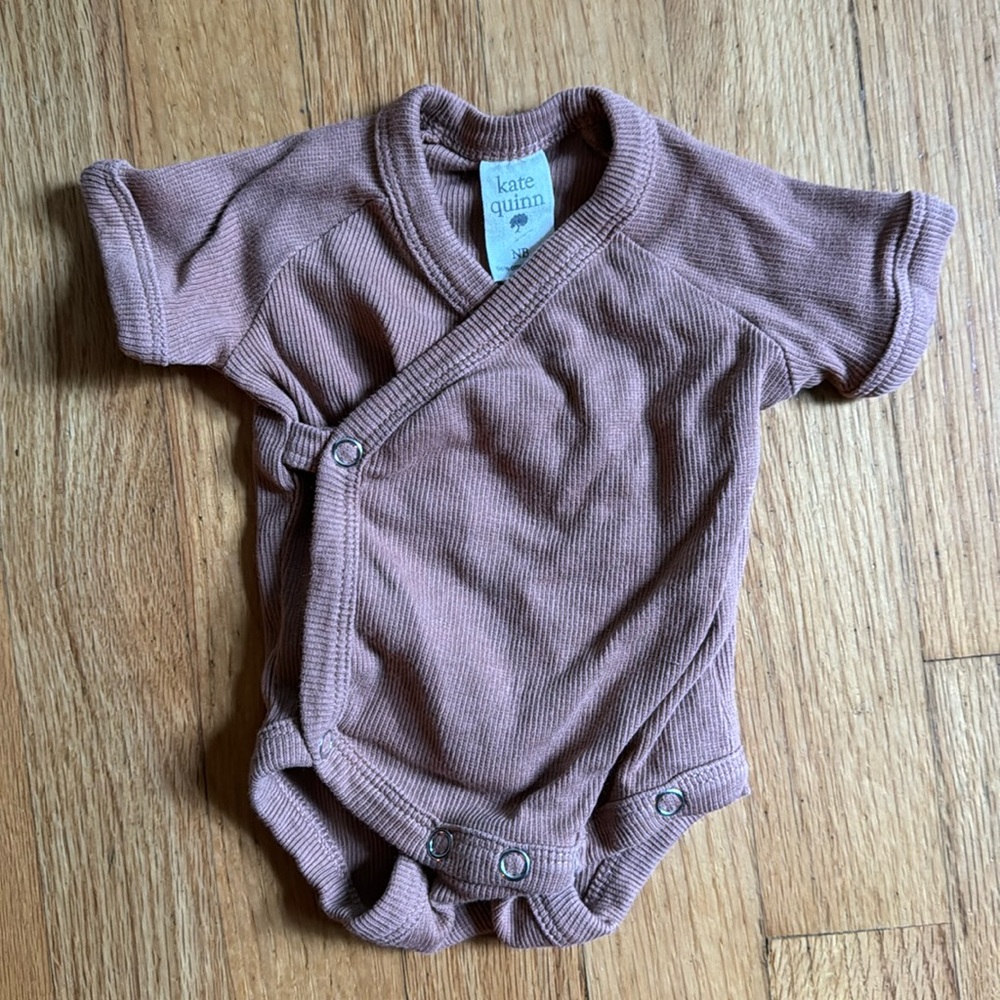 Kate Quinn NB organic cotton bodysuit